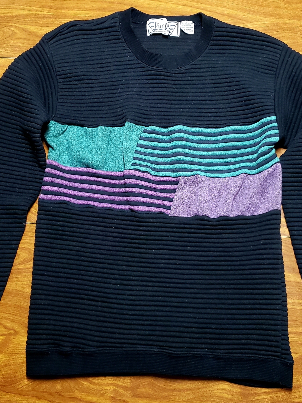 Black Ribbed Crewneck Sweater with Teal and Purple Panels